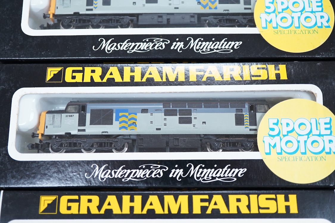 Four boxed Graham Farish N gauge railway Class 37 diesel locomotives; a BR, 37 408 (8035), a BR Coal Sector, 37696 (8036), a BR Petroleum Sector, 37 887 (8037) and a BR Railfreight Metals, 37 906 (8038).